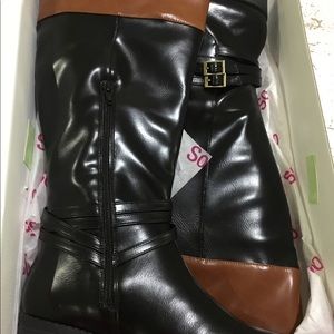 NEW BOOTS never worn. In the original box